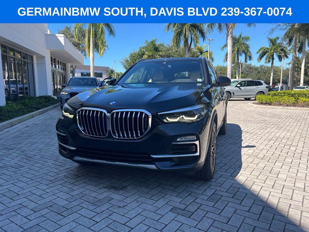 Used 2021 Black Sapphire Metallic BMW sDrive40i image 2