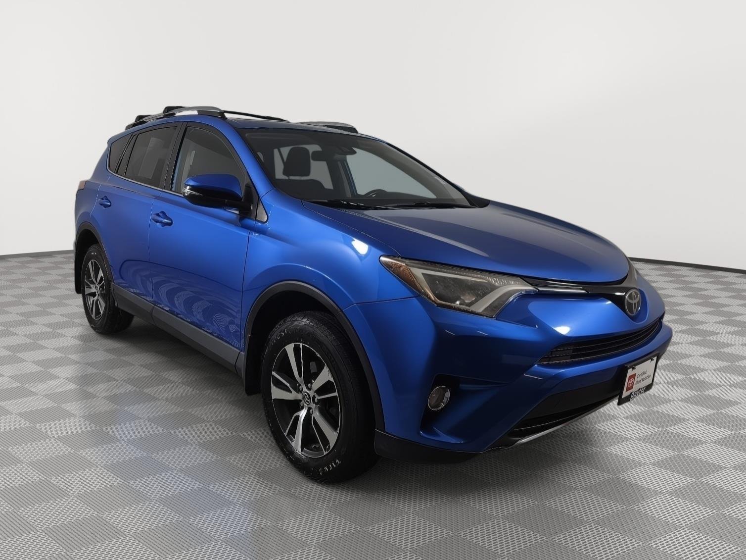 Used 2017 Electric Storm Blue Toyota XLE image 1