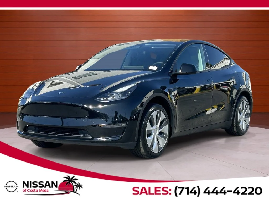Used 2023 Solid Black Tesla Standard Range image 1