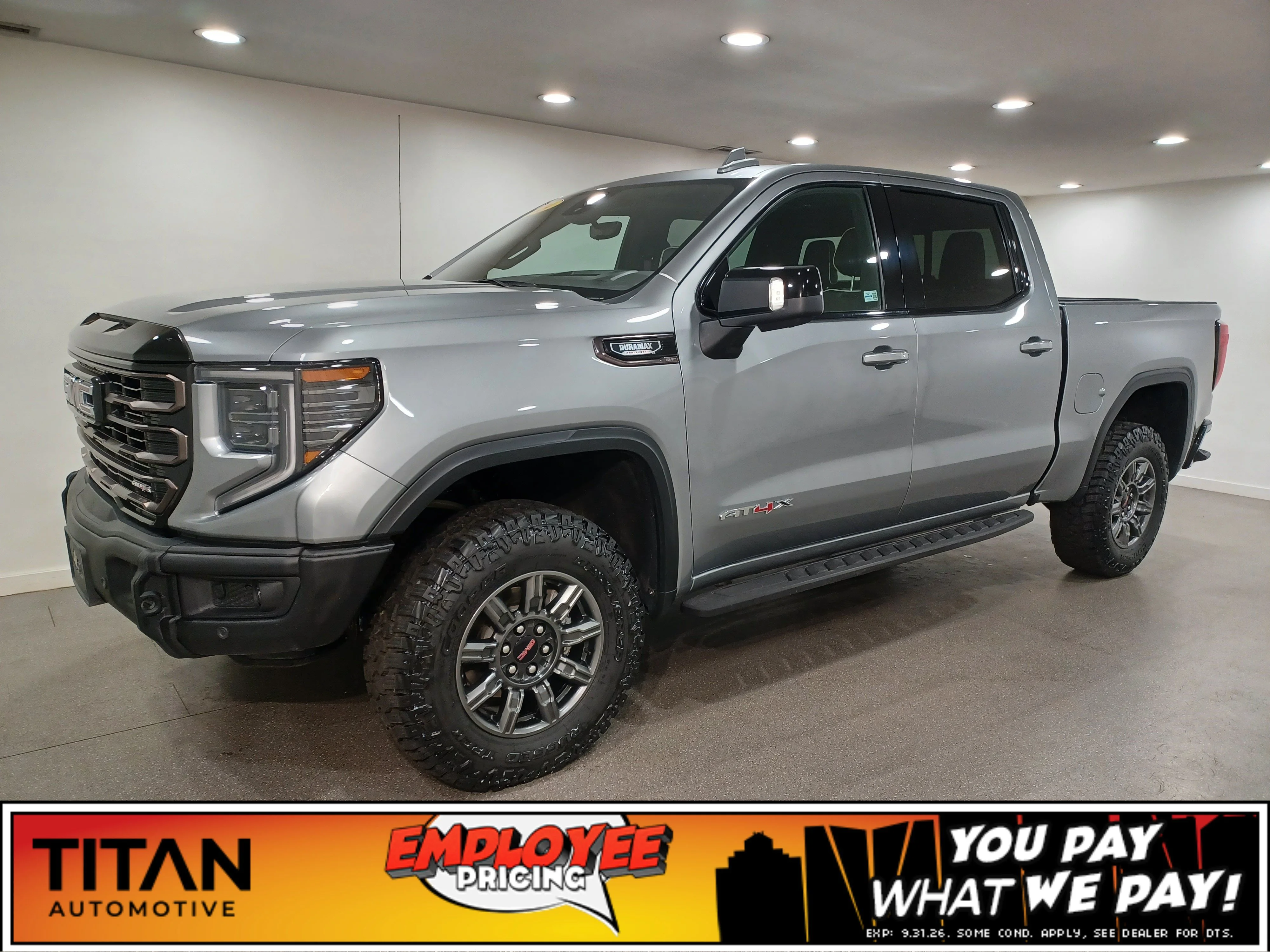 Used 2024 Sterling Metallic GMC AT4X 4WD*3.0L Duramax | Adaptive Cruise | Remote Start | Cooled Leather | Sunroof | Htd Wheel | AEV image 1