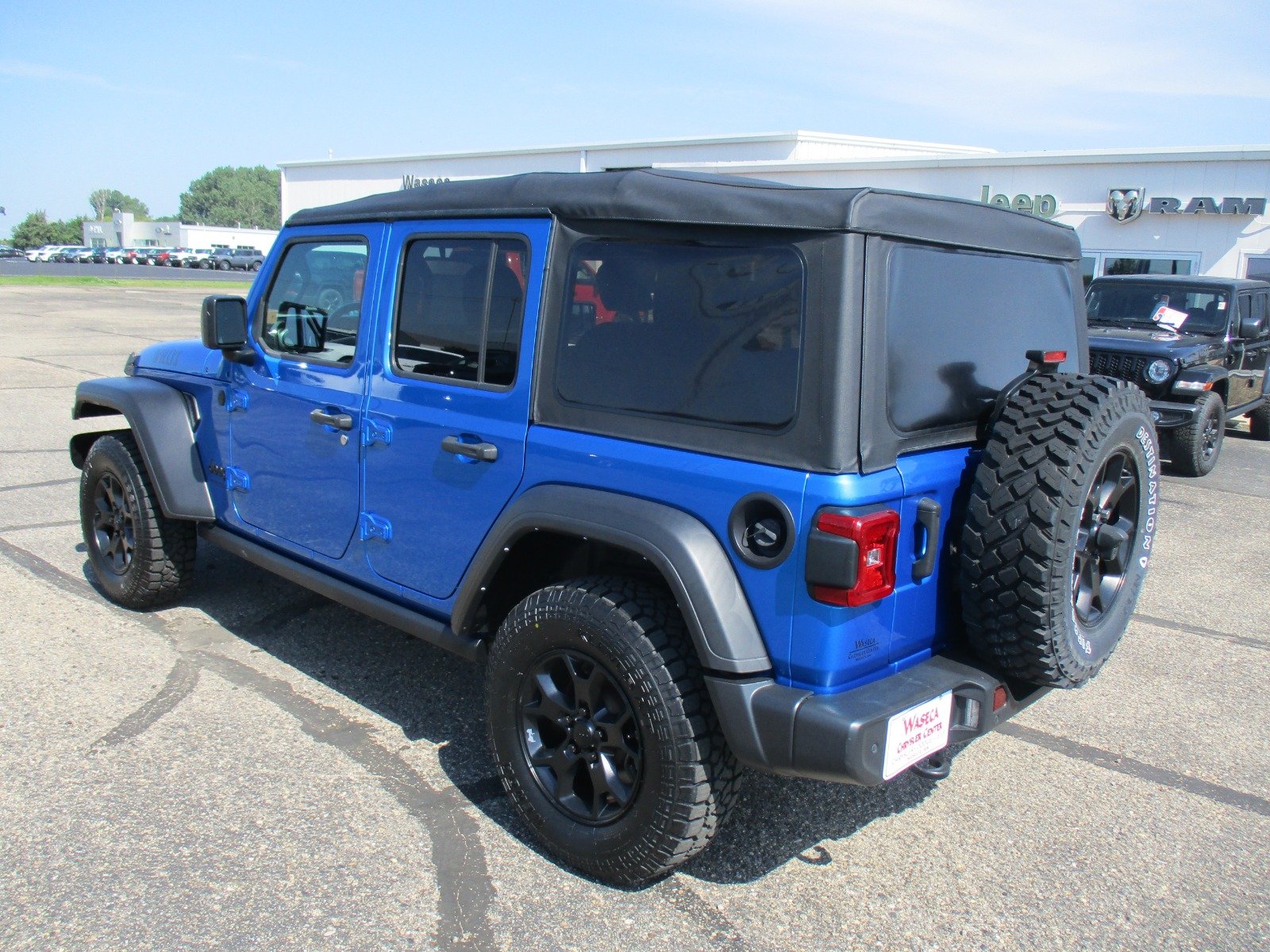 Used 2022 HYDRO BLUE Jeep Sport image 4