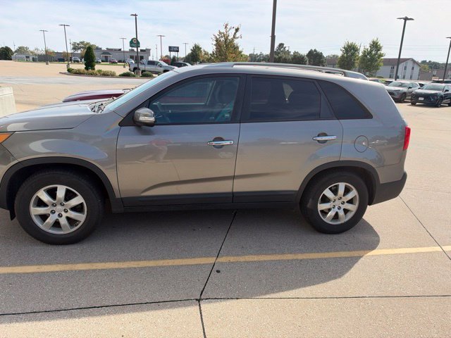 Used 2011 Kia Sorento LX with VIN 5XYKT3A15BG076657 for sale in Davenport, IA