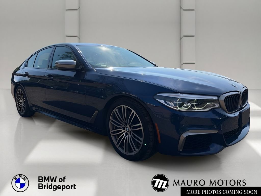 Used 2020 Blue BMW M550i xDrive image 1