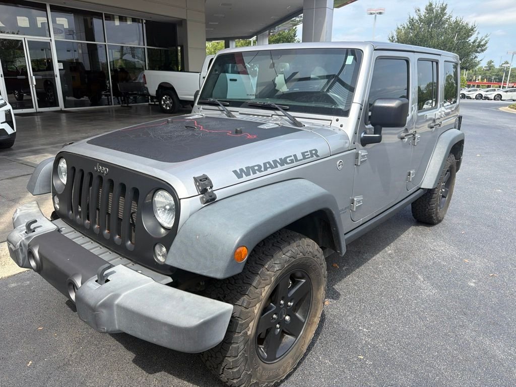 Used 2017 Silver Jeep Unlimited Sport image 2