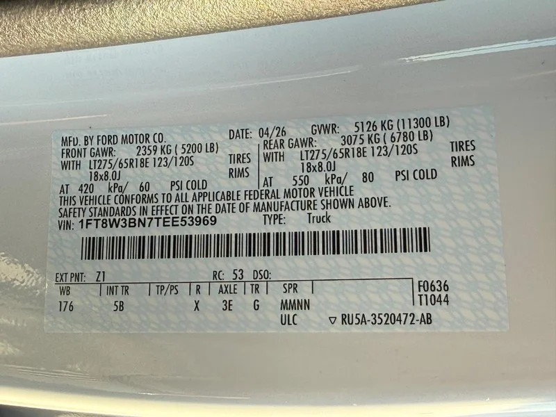New 2026 Oxford White Ford LARIAT 4WD Crew Cab 6.75