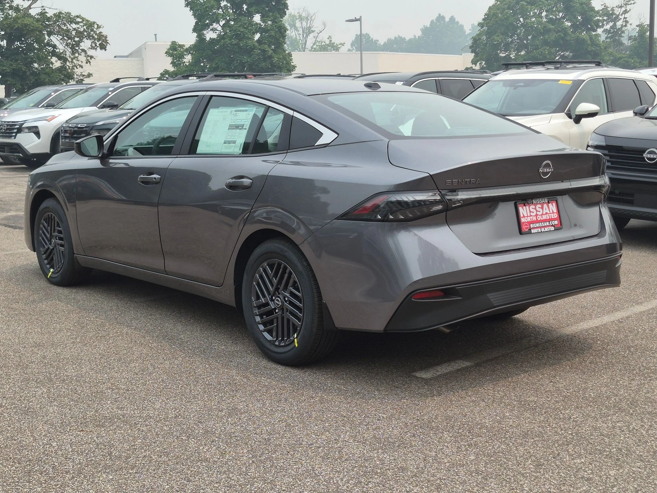 New 2026 Gun Metallic Nissan SV image 8
