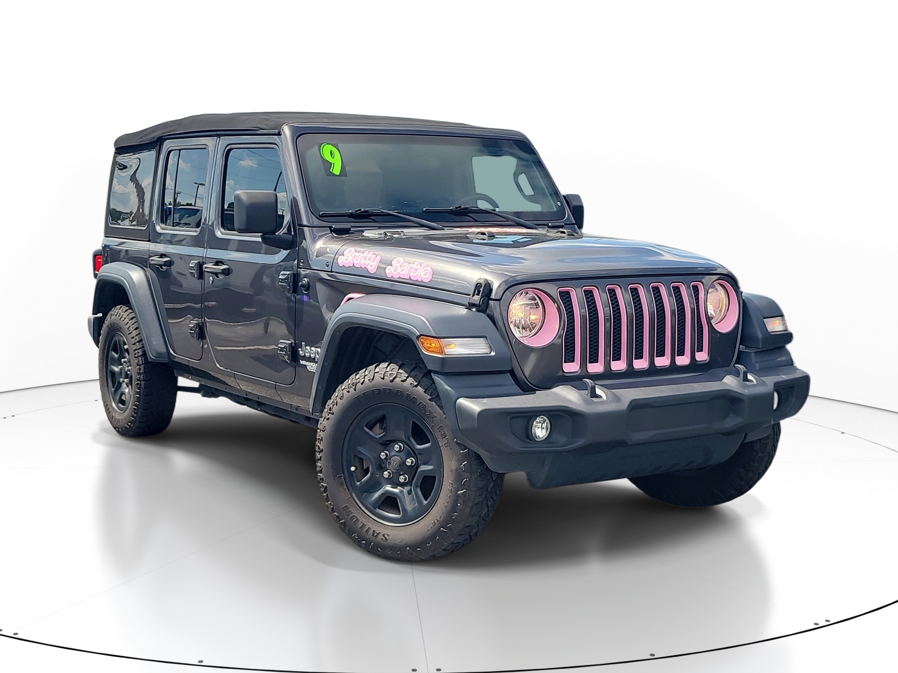 Used 2019 Granite Crystal Metallic Clearcoat Jeep Sport image 1