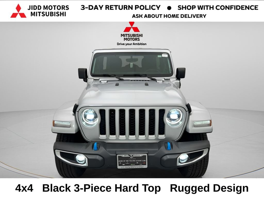 Used 2023 Jeep Wrangler 4xe Sahara 4XE with VIN 1C4JJXP65PW661003 for sale in Des Plaines, IL