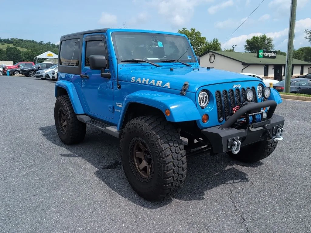 Used 2011 Blue Jeep Sahara image 4