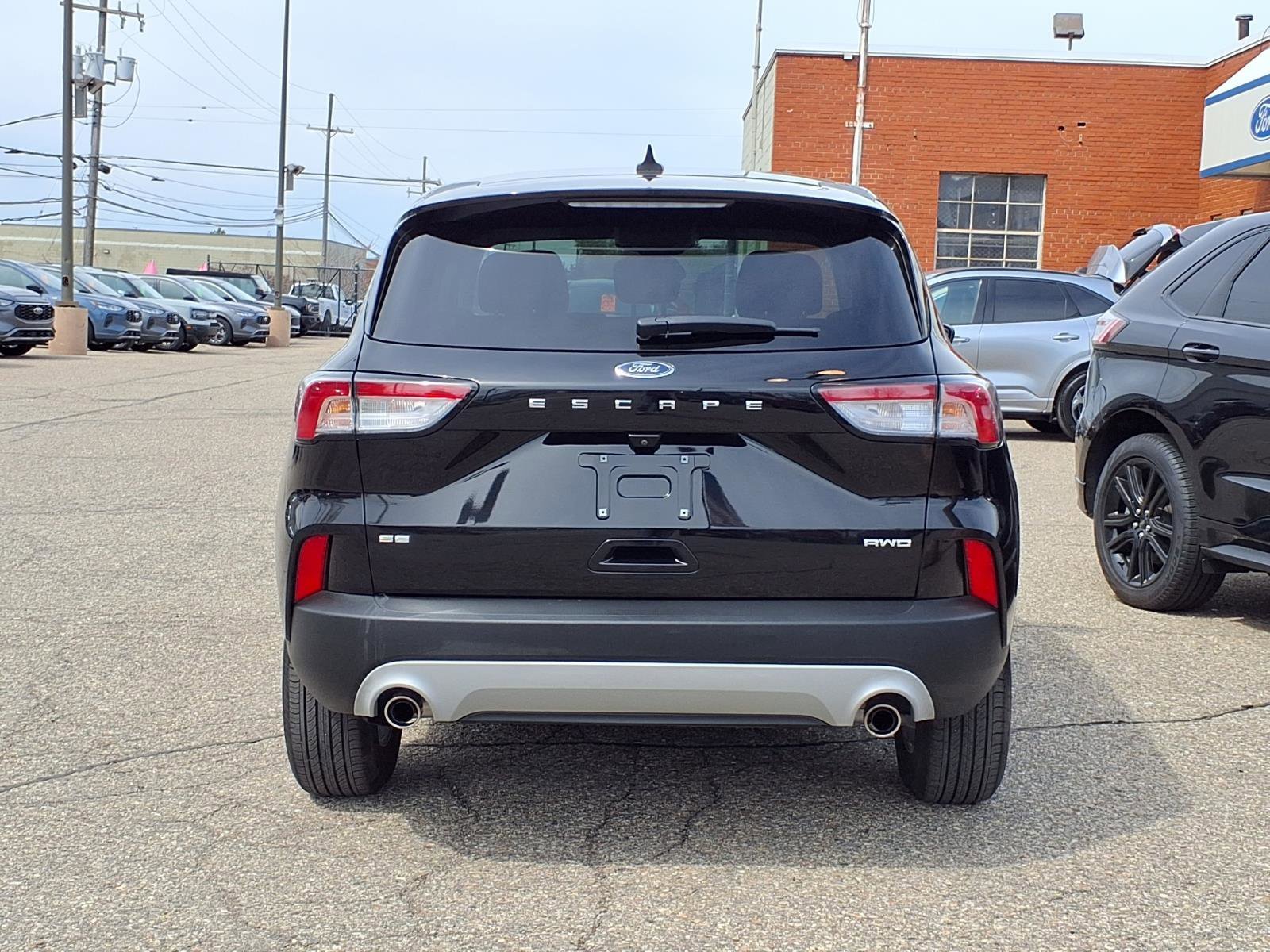 Certified Used 2021 Agate Black Metallic Ford SE image 22