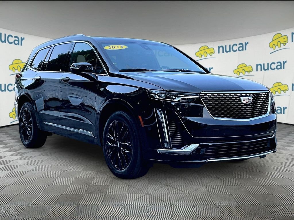 Used 2024 Black Cadillac Luxury image 1