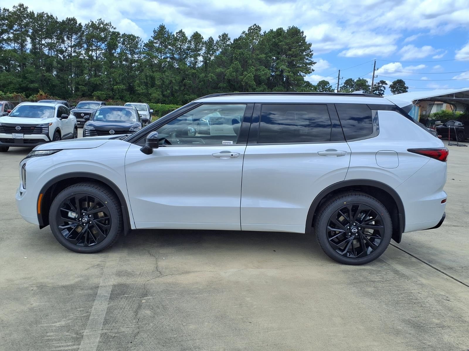 2026 Nissan Rogue Plug-In Hybrid Platinum White at Sterling McCall Nissan