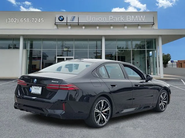 Used 2026 Black Sapphire Metallic BMW 550e xDrive image 4