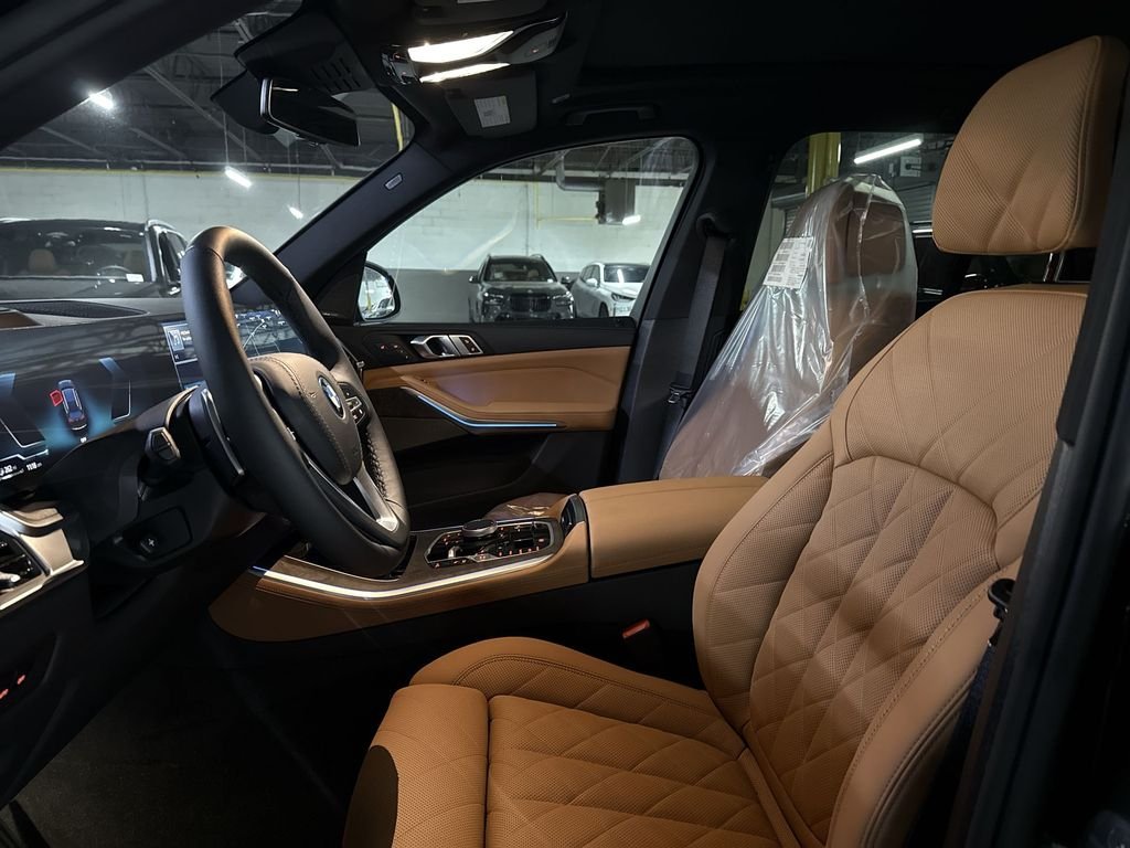 New 2026 Black Sapphire Metallic BMW xDrive50e image 11