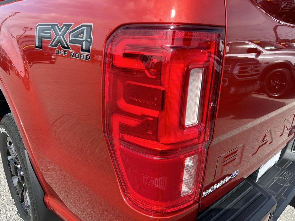 Certified Used 2023 Hot Pepper Red Metallic Tinted Clearcoat Ford Lariat image 11