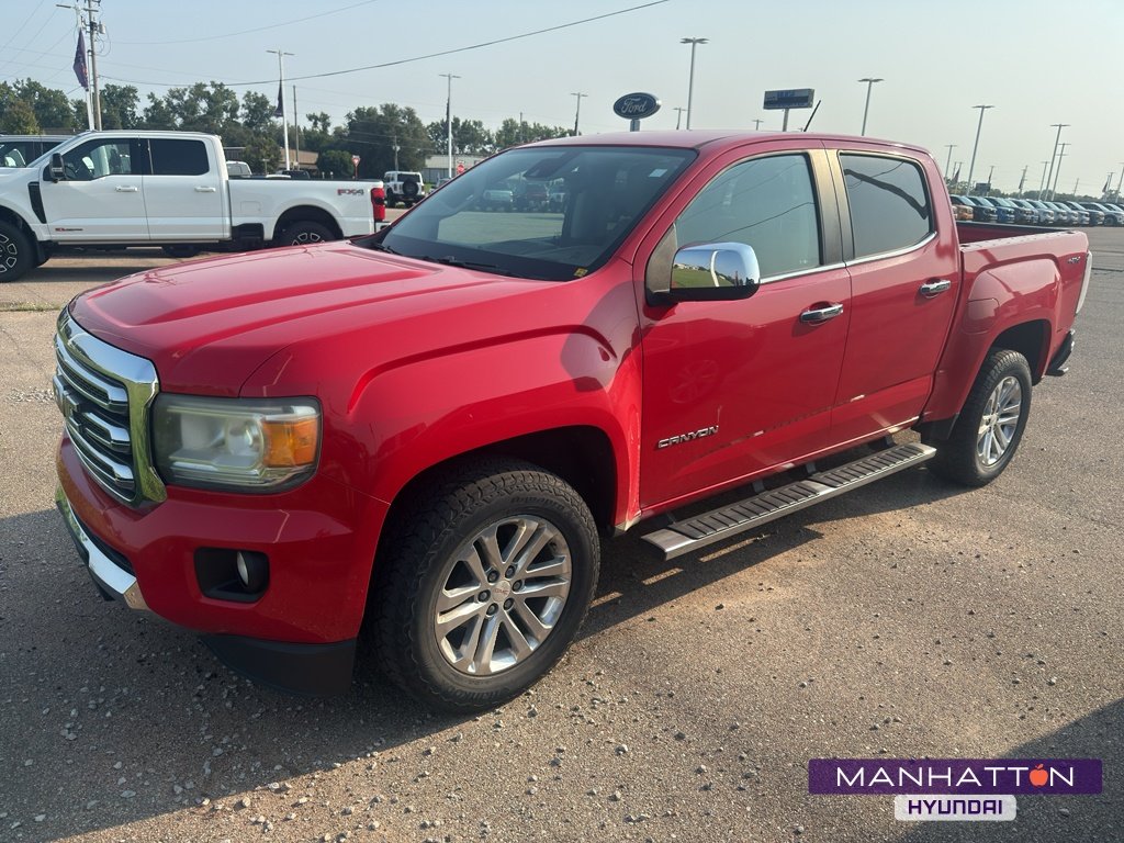 Used 2016 Cardinal Red GMC 4WD SLT image 1