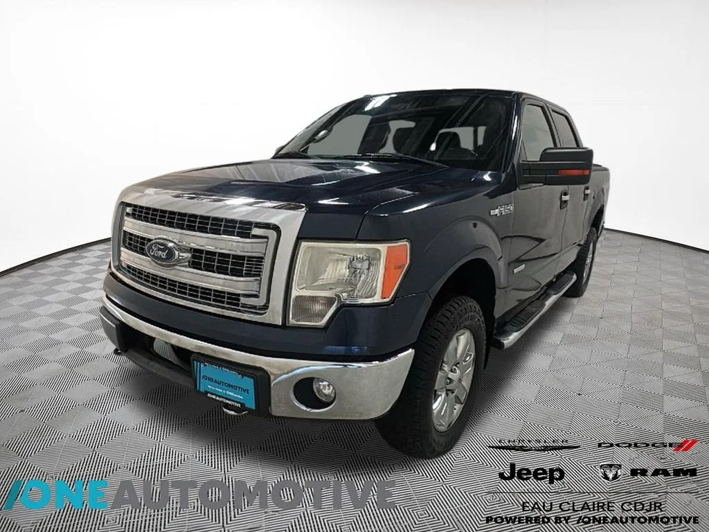 Used 2013 Blue Ford XLT image 1