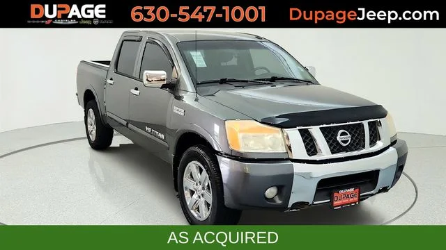 Used 2010 Gray Nissan LE image 1
