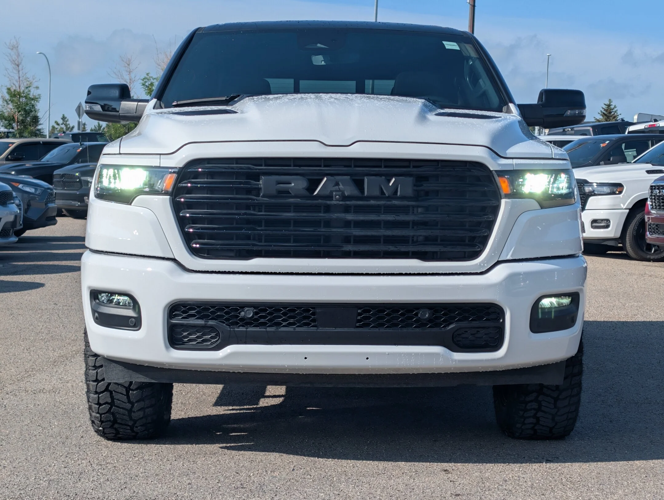 New 2026 White RAM Sport - - 2in Level Kit - Radar Renegade RT Tires - Tonneau Cover - Pano Sunroof & More! image 3
