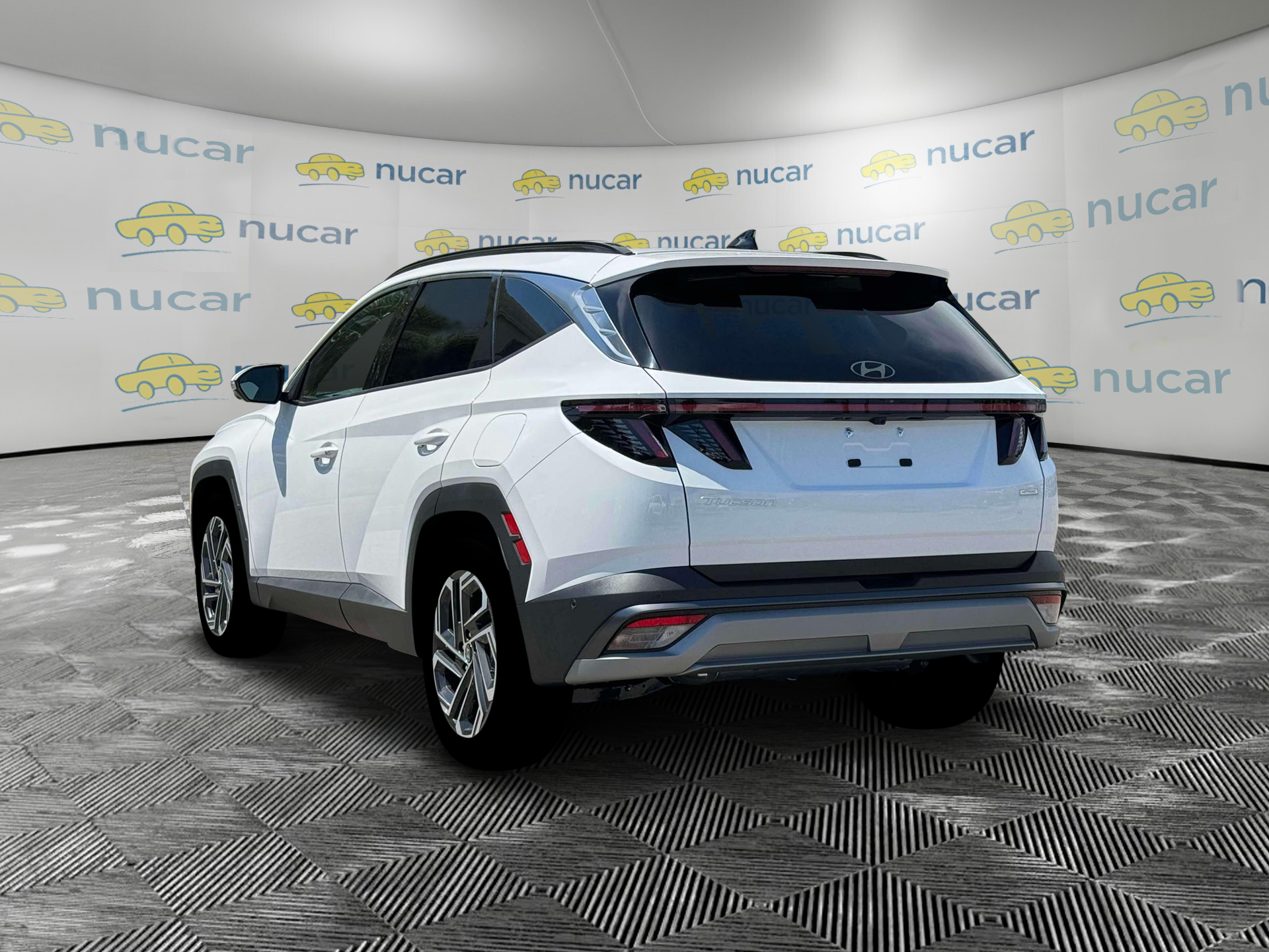 2026 Hyundai Tucson Limited in White at Nucar — photo 5