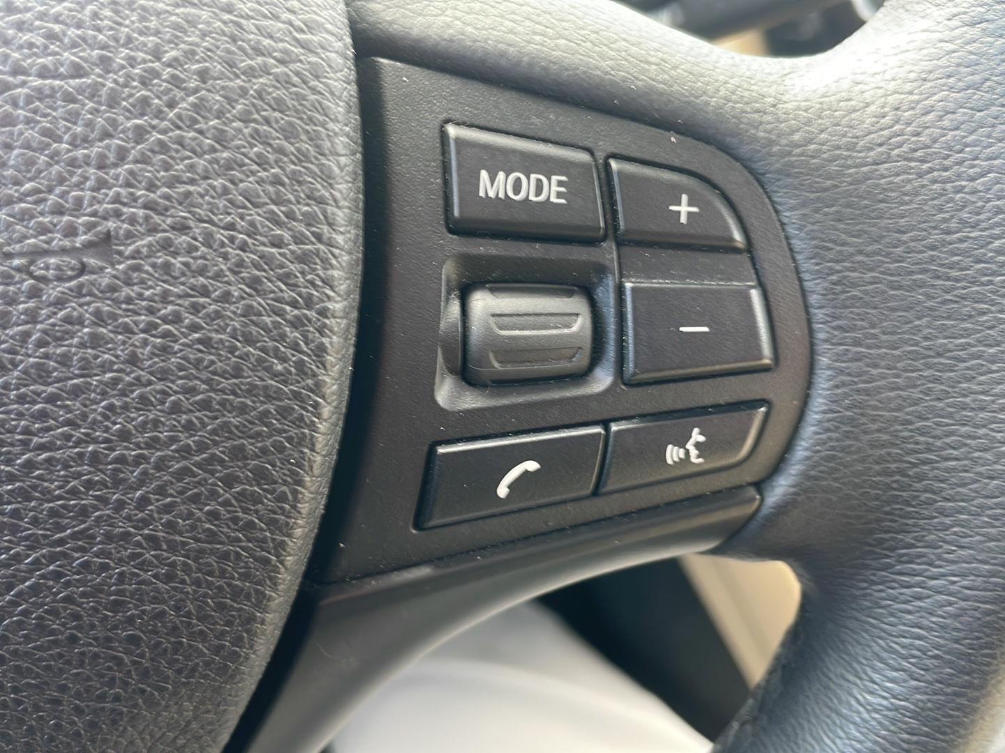 Used 2018 Mediterranean Blue Metallic BMW 320i xDrive image 2