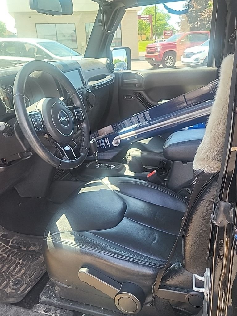 Used 2015 Black Clearcoat Jeep Sahara Altitude image 2