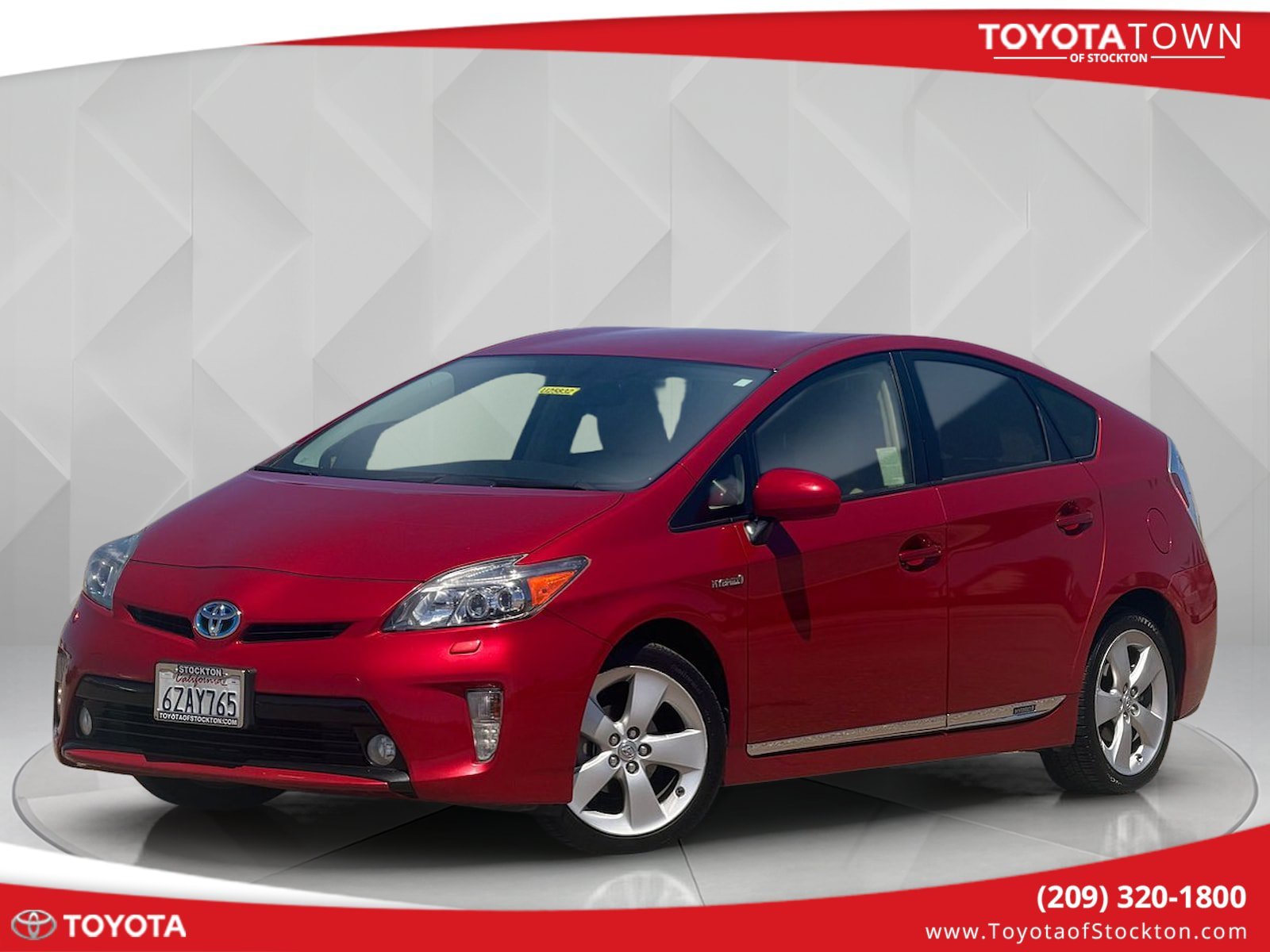 Used 2012 Barcelona Red Metallic Toyota Five image 1