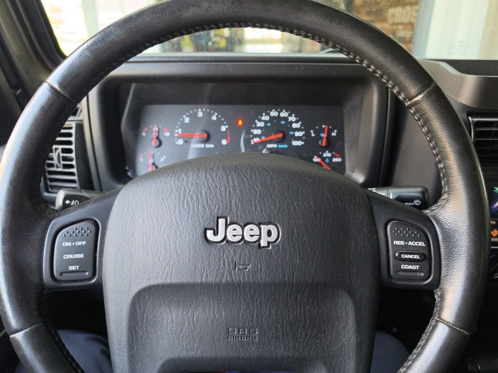 Used 2004 Light Khaki Metallic Jeep Unlimited image 10