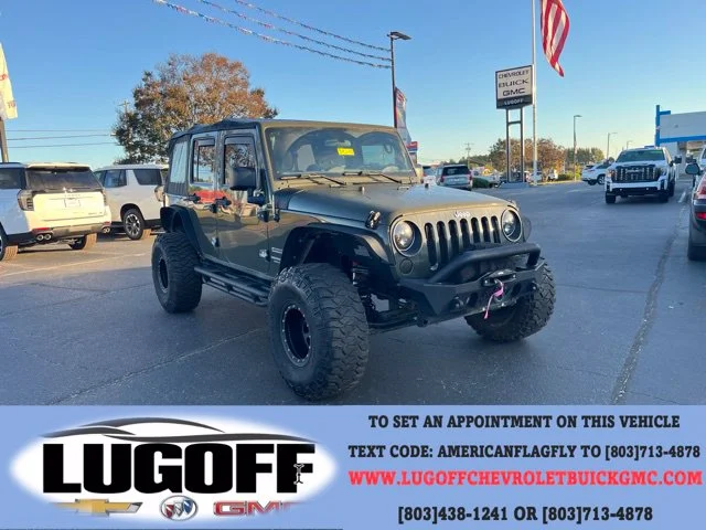 Used 2016  Jeep Unlimited Sport image 1