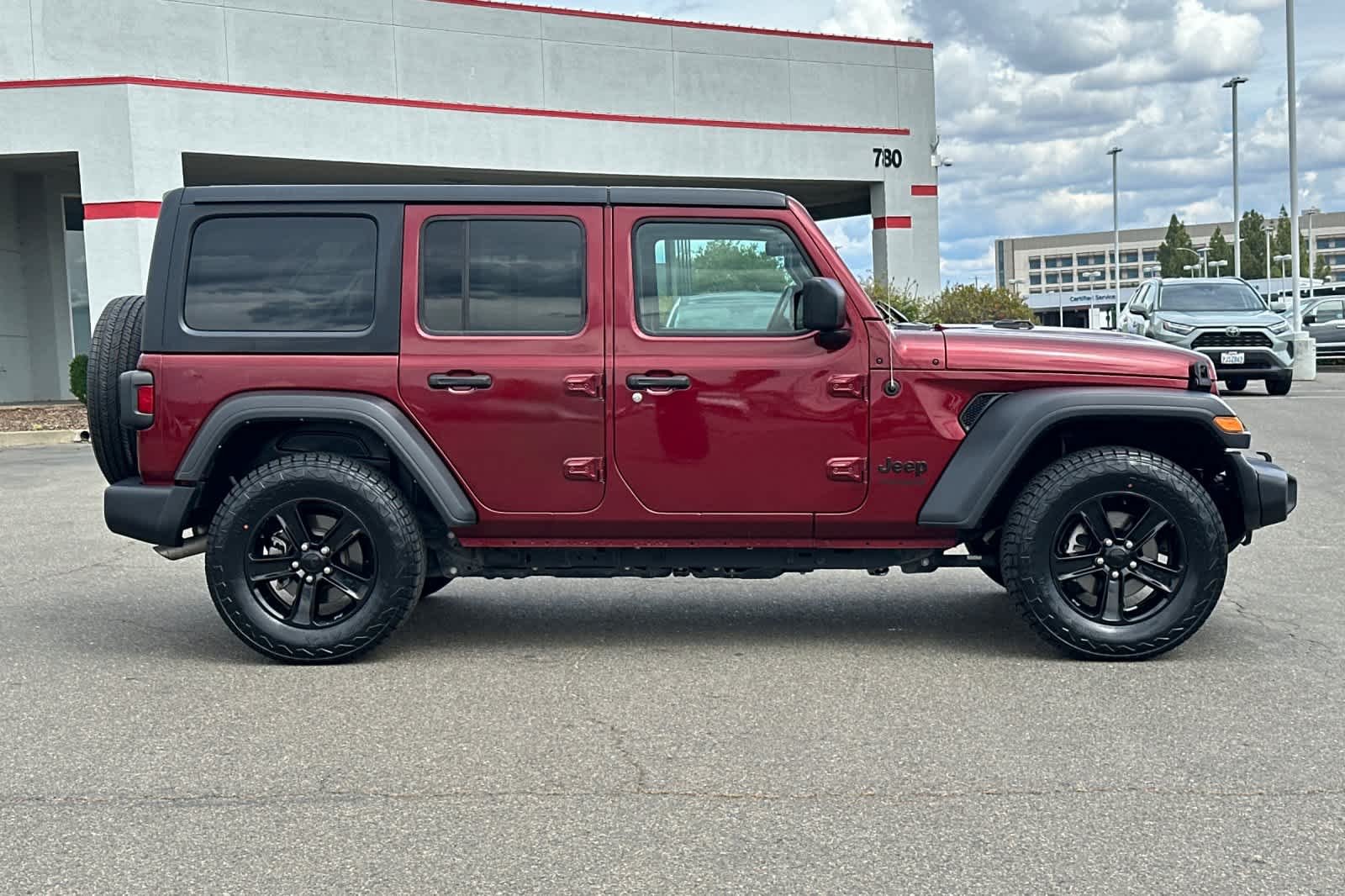Used 2022 Snazzberry Pearlcoat Jeep Unlimited Sport Altitude image 6