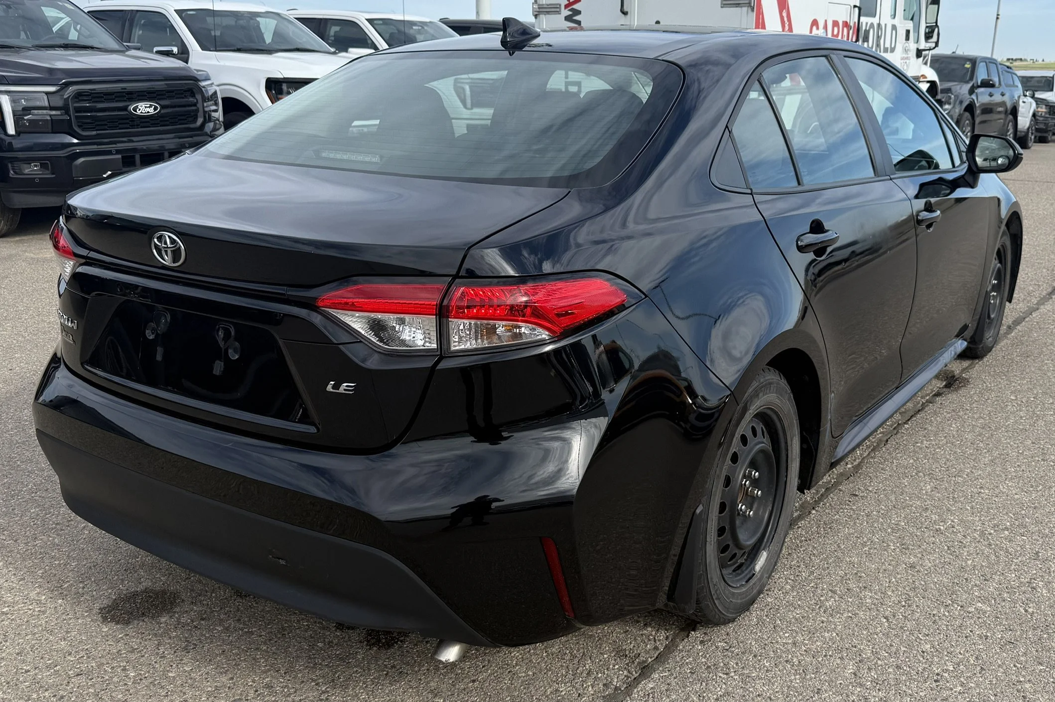 Used 2023 BLACK Toyota LE image 3