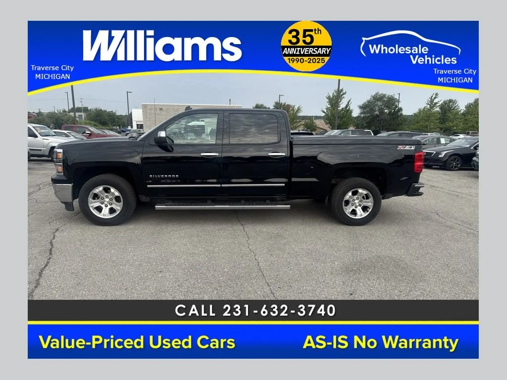 Used 2014 Black Chevrolet LTZ image 1