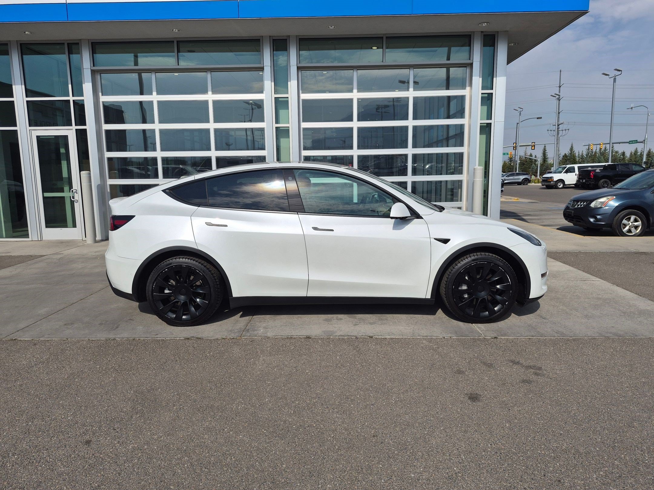Used 2021 Tesla Model Y Long Range with VIN 5YJYGAEEXMF250992 for sale in American Fork, UT