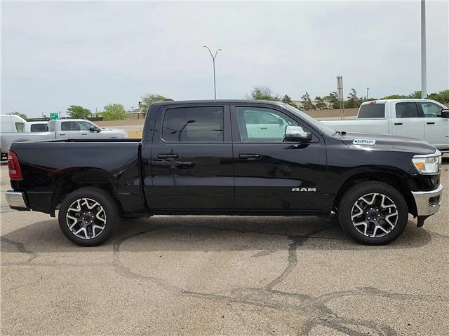 Used 2024 Diamond Black Crystal Pearlcoat RAM Laramie 4x4 Crew Cab 144.5 in. WB image 4