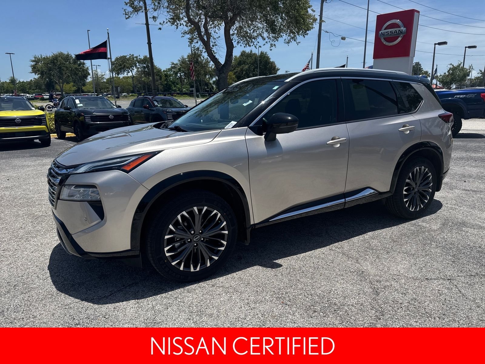 Certified Used 2024 Gold Nissan Platinum image 2