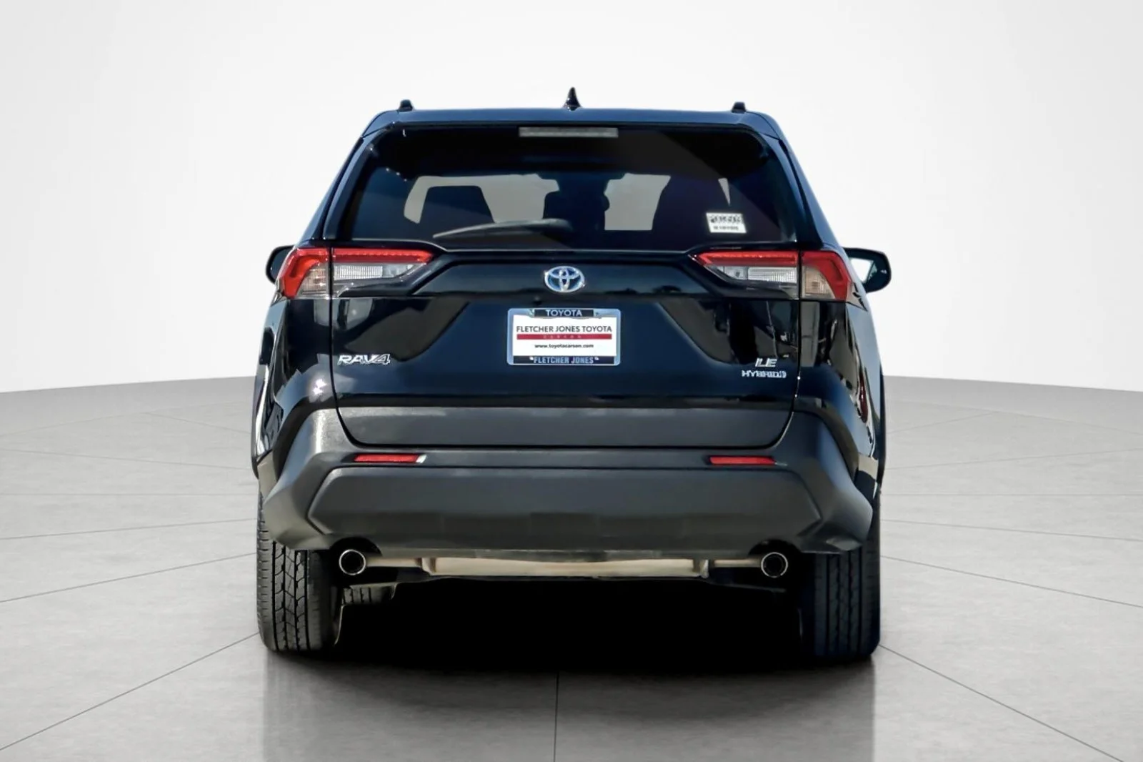 Used 2024 Midnight Black Metallic Toyota Hybrid LE image 4