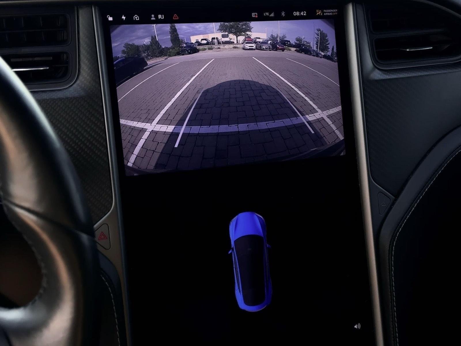 Used 2021 Solid Black Tesla Performance image 15