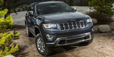 Used 2015 Bright White Jeep Limited image 1