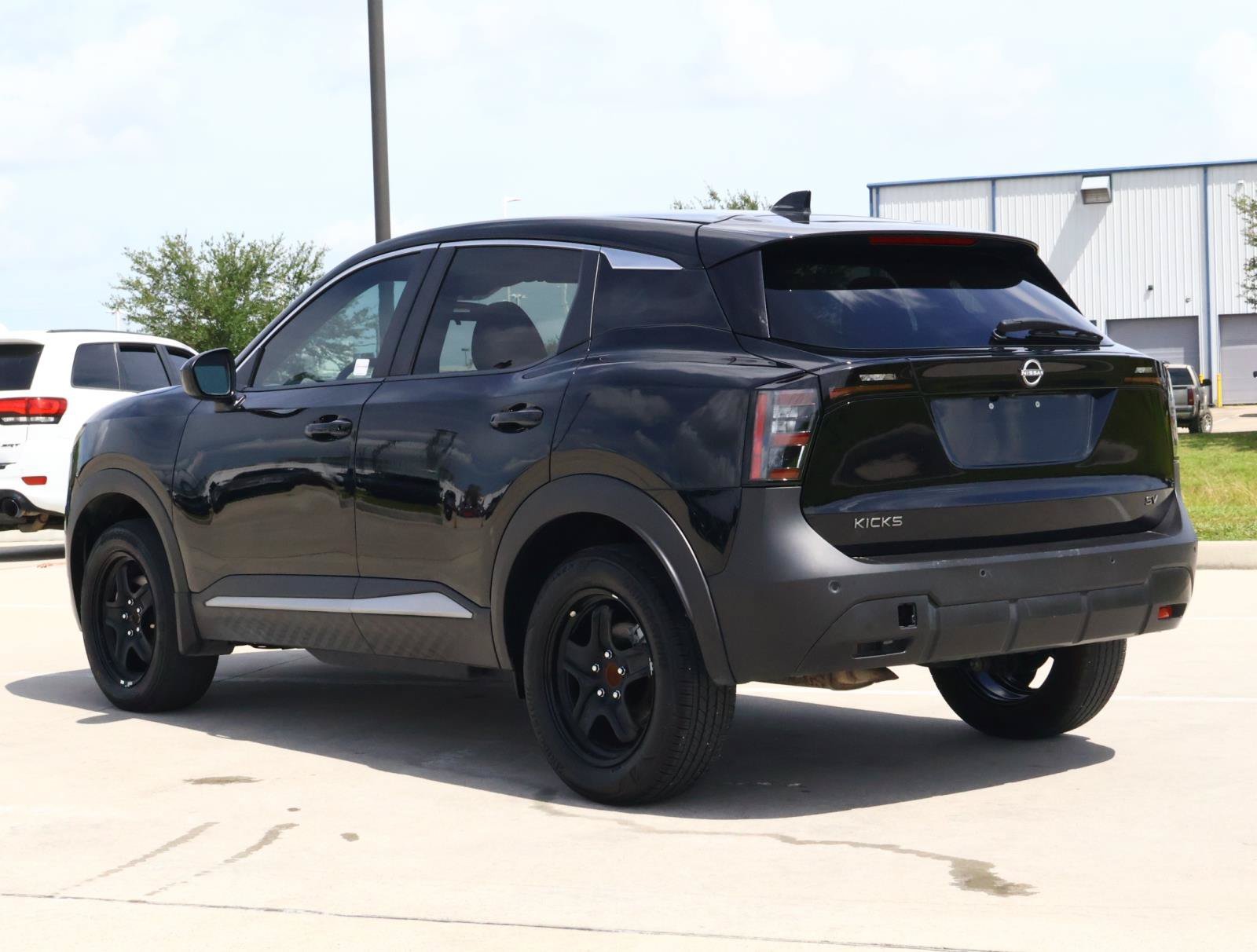 Used 2025 Super Black Nissan SV image 3