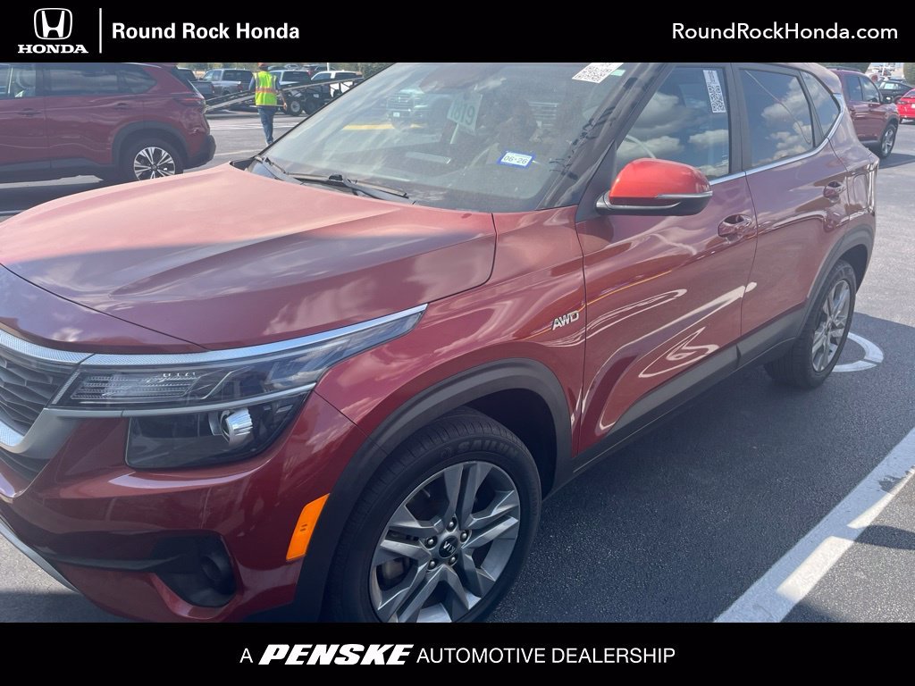 Used 2021 Orange Kia S image 1