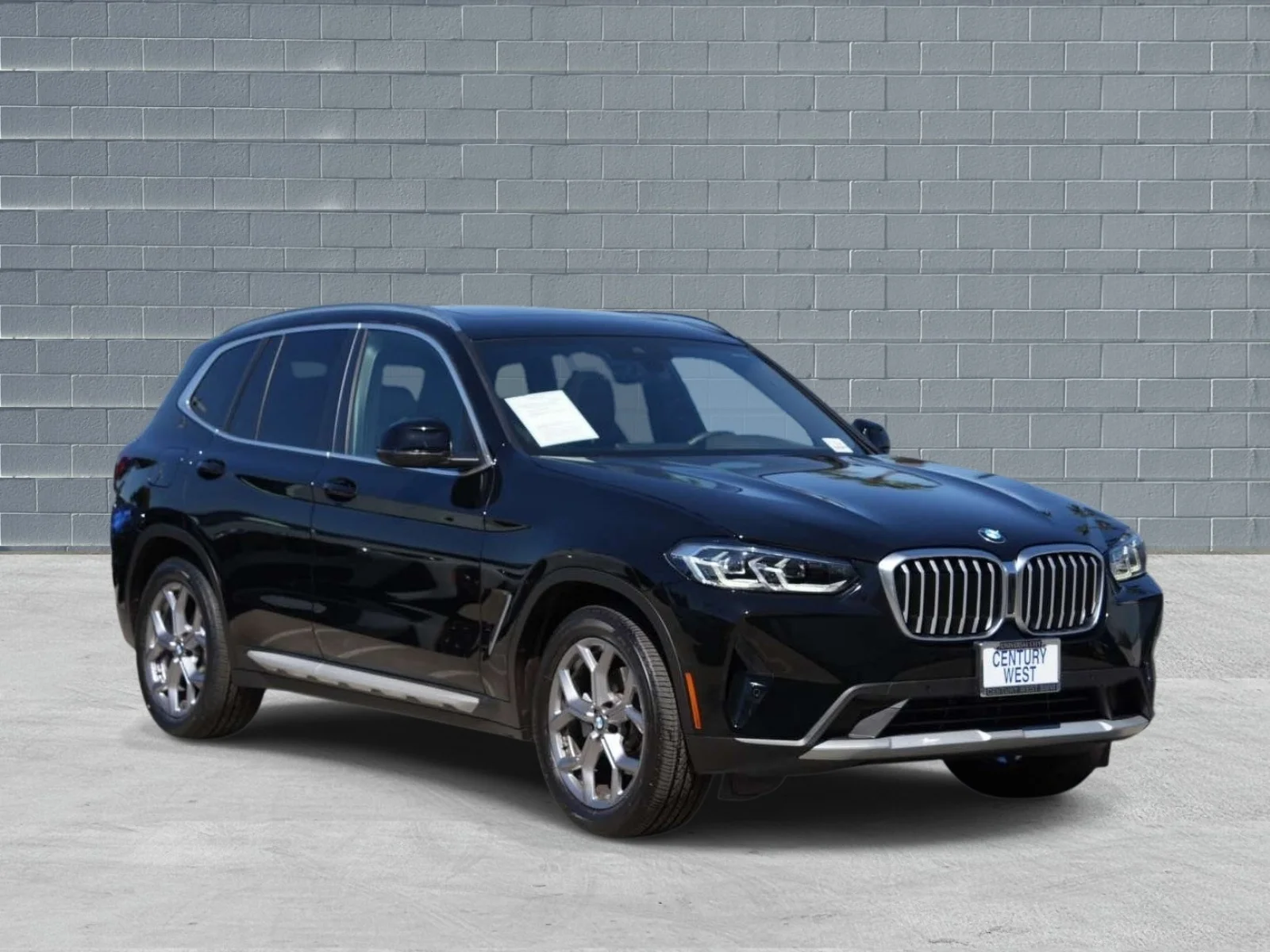 Certified Used 2024 Jet Black BMW sDrive30i Sports Activity Vehicle image 1