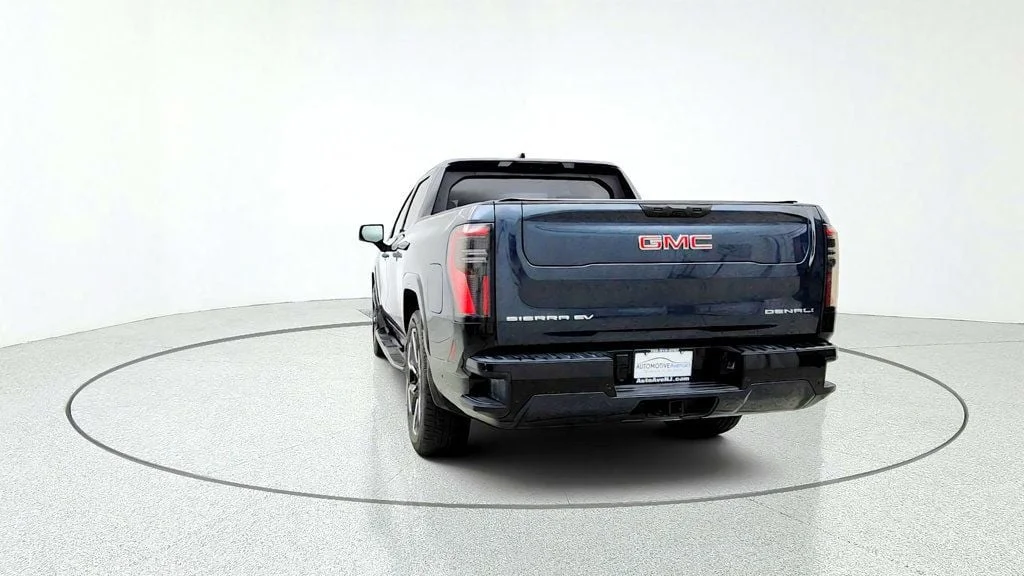 Used 2026 Deep Ocean Metallic GMC e4WD Crew Cab Max Range Denali image 6