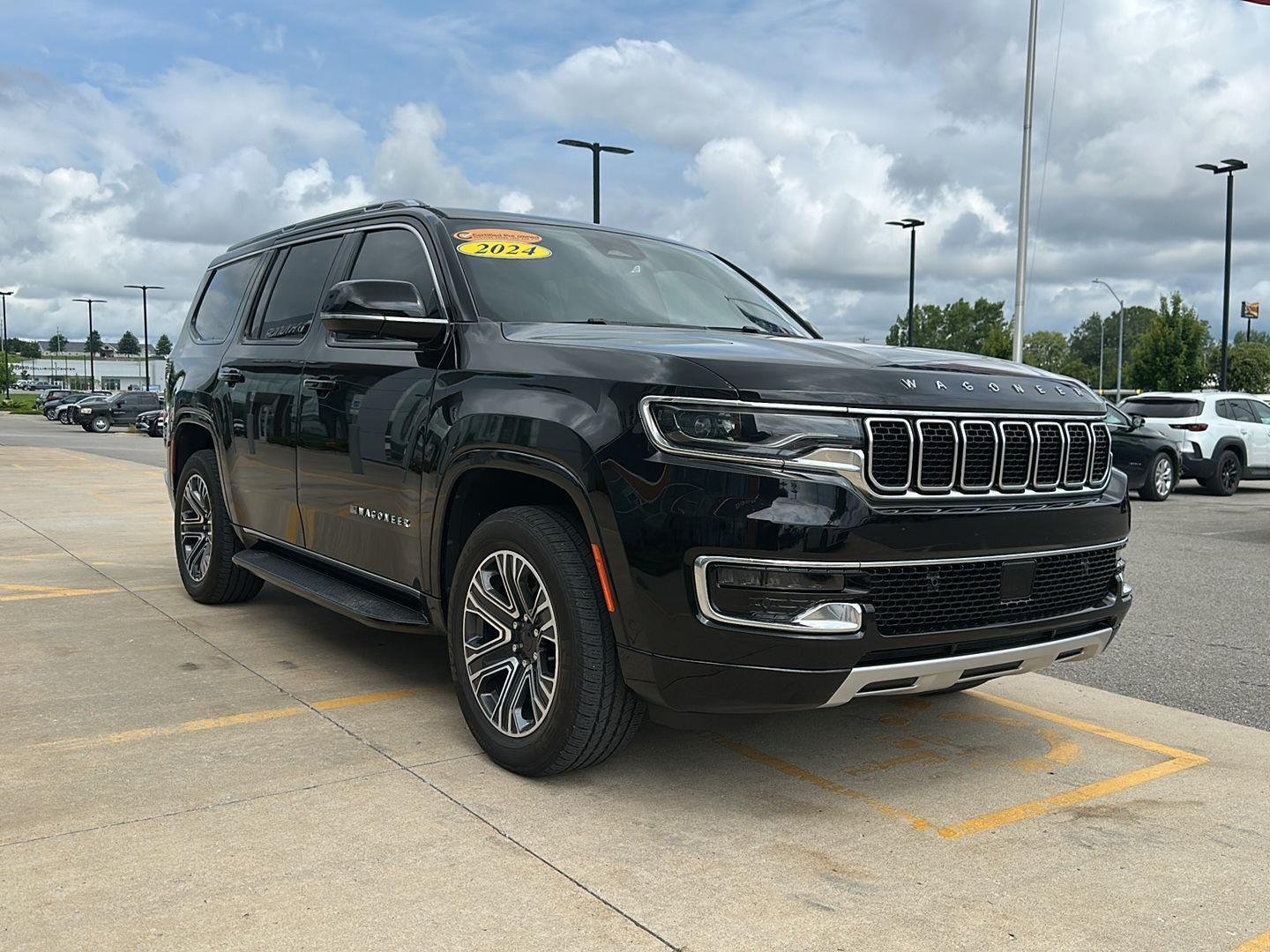 Used 2024 Diamond Black Crystal Pearlcoat Jeep Series II image 5