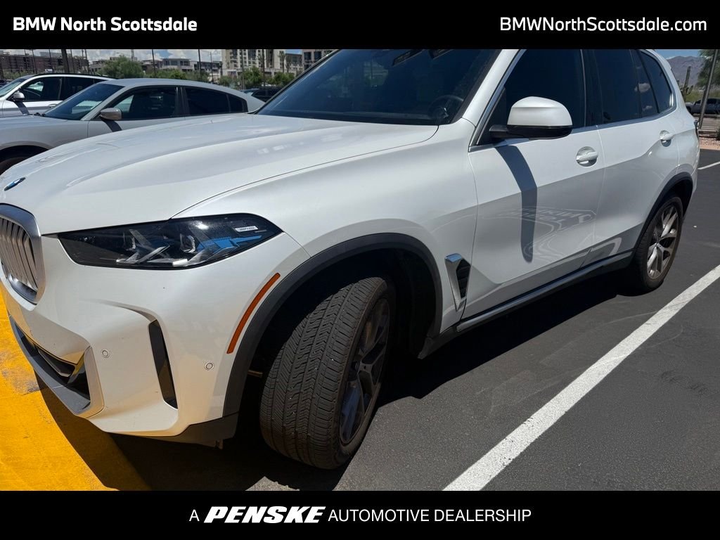Certified Used 2024 White Metallic BMW xDrive40i image 1