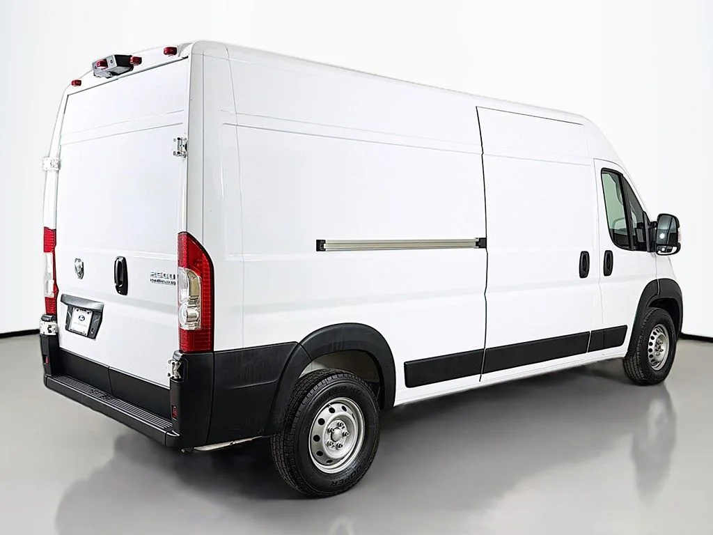 Used 2025 Bright White Clearcoat Ram High Roof image 6