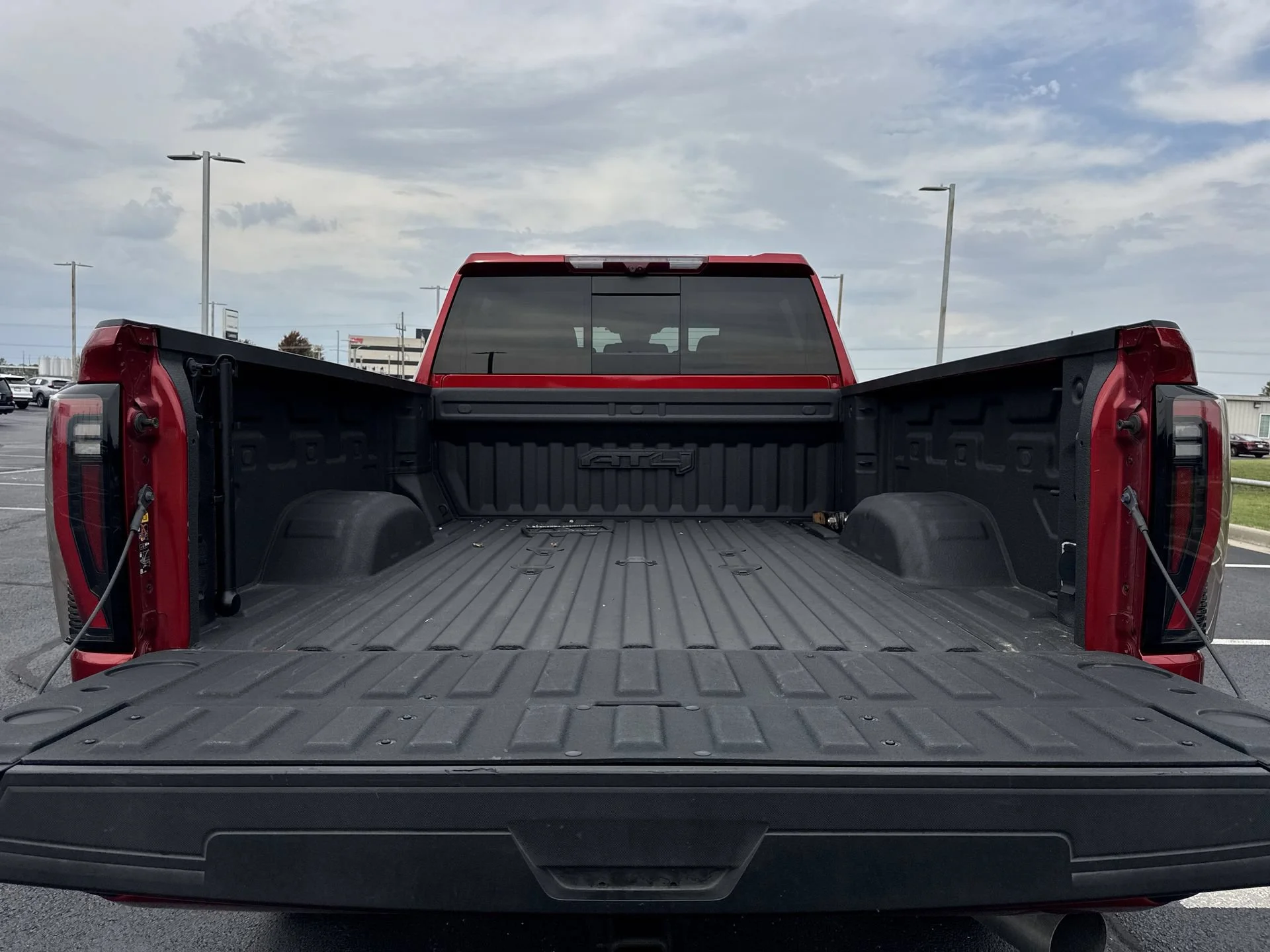 Used 2024 Volcanic Red Tintcoat GMC AT4 image 23