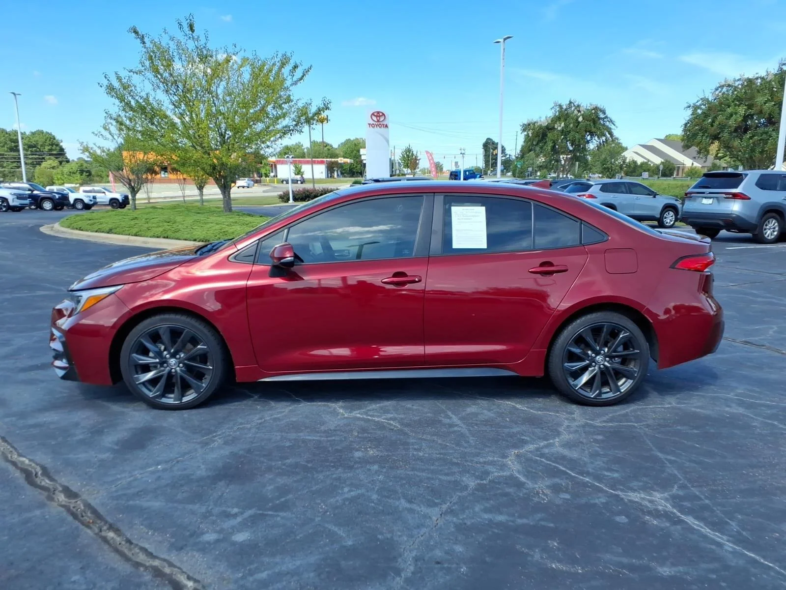 Used 2024 Ruby Flare Pearl Toyota SE image 3