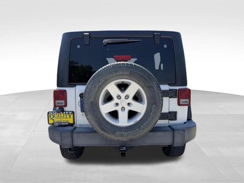 Used 2016 White Jeep Unlimited Sport image 4