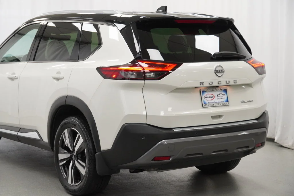 Used 2023 Pearl White Trico Nissan SL image 16