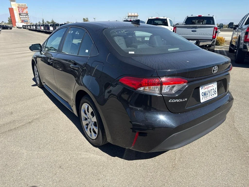 Used 2024 Midnight Black Metallic Toyota LE image 4